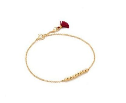 Bracelet porte bonheur doré mat