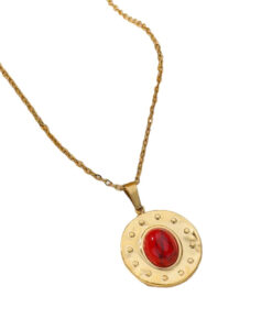 Collier medaille pierre rouge