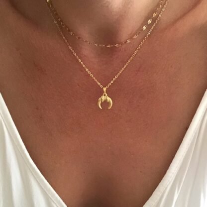 collier multirangs corne-lune tendance 2024
