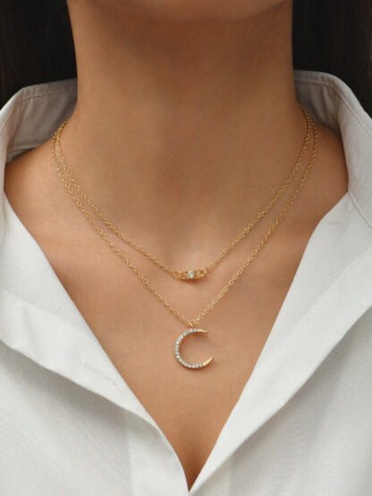 collier multirangs lune strass dore