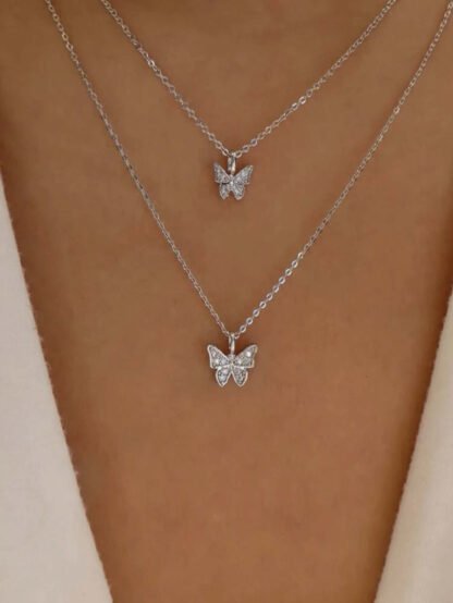 collier multirangs papillon strass argent