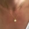 collier multirangs pendentif soleil plaque or